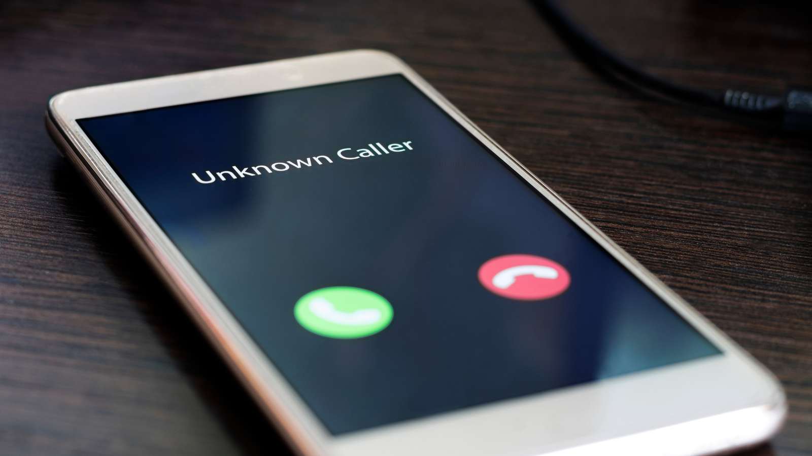 Image of phone with unknown caller on the display